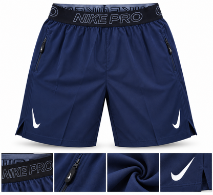 Short de sport homme Nike Pro – Bleu marine et blanc, avec poches zippées
