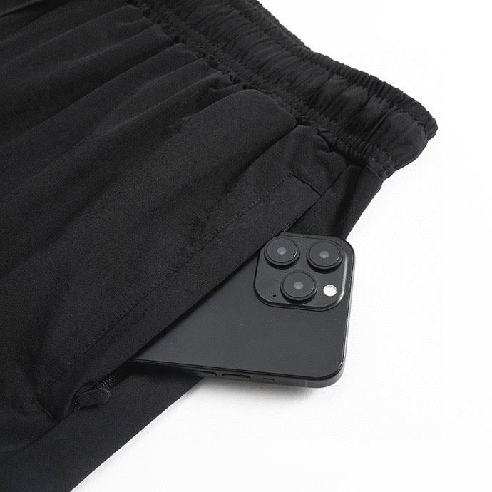 Ensemble Survêtement Under Armour Homme Noir – Performance & Confort Sport