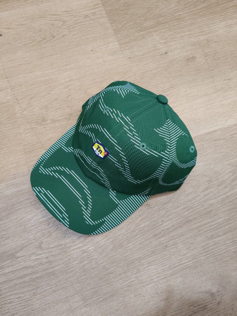 Casquette Nike Air verte à motifs blancs – Style sportif et tendance